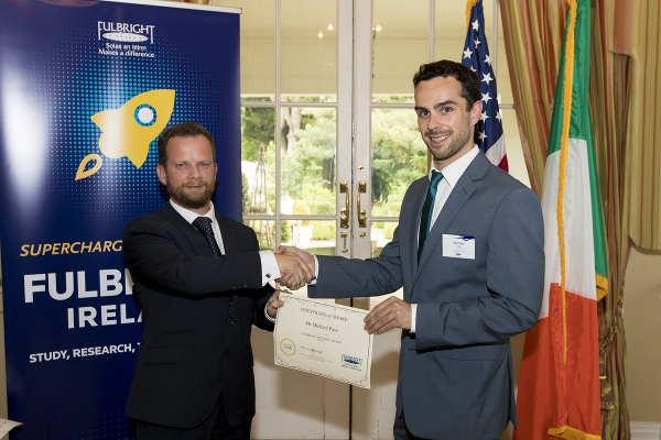 Dr Michael Paye receiving his Fulbright-NUI Award from Dr Dara FitzGerald, Executive Director of the Fulbright Commission in Ireland at the 2016 Fulbright Awards Ceremony.