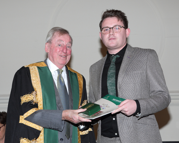 James receiving his Travelling Studentship award from NUI Chancellor Dr Maurice Manning at the 2016 NUI Awards Ceremony