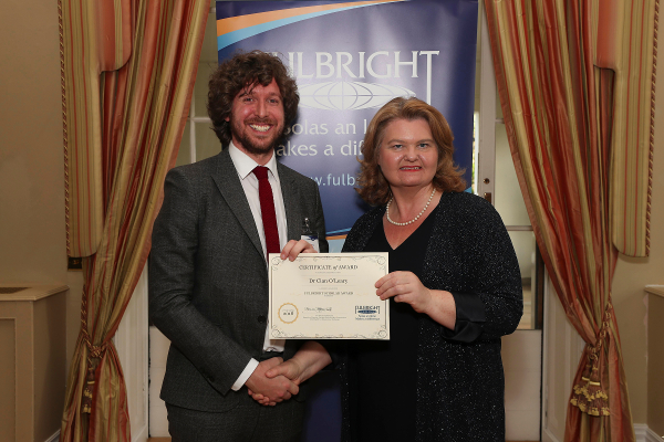 Dr Cian O’Leary, RCSI (L) receiving his award from Fulbright Commission Board Chairperson, Dr Sarah Ingle at the 2018 Fulbright Awards Ceremony in the U.S. Ambassador’s Residence, Deerpark, Dublin.