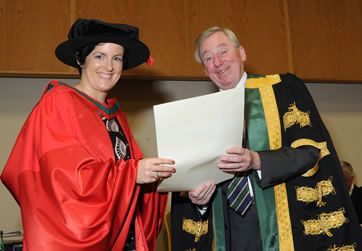 RCSI Recipient Receiving Her Parchment from NUI Chancellor Dr Maurince Manning