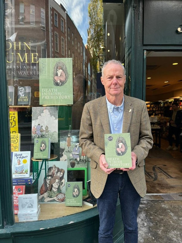 Gabriel Cooney outside Hodges Figgis, Dawson St, Dublin 2, with his award-winning book Death in Irish Prehistory. 
[image courtesy of the Royal Irish Academy]